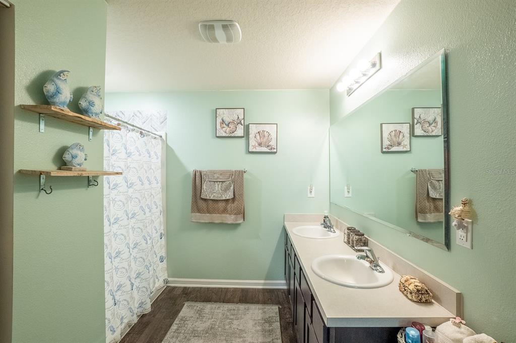 15 Grand Par Court Bunnell, FL 32110 - Photo 30 of 61 a bathroom with a sink a toilet and shower