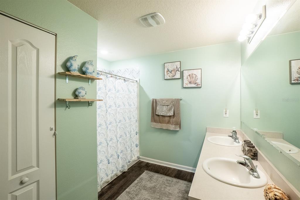 15 Grand Par Court Bunnell, FL 32110 - Photo 31 of 61 a bathroom with a sink a toilet and shower