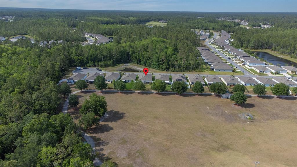 15 Grand Par Court Bunnell, FL 32110 - Photo 49 of 61 an aerial view of a house with a street