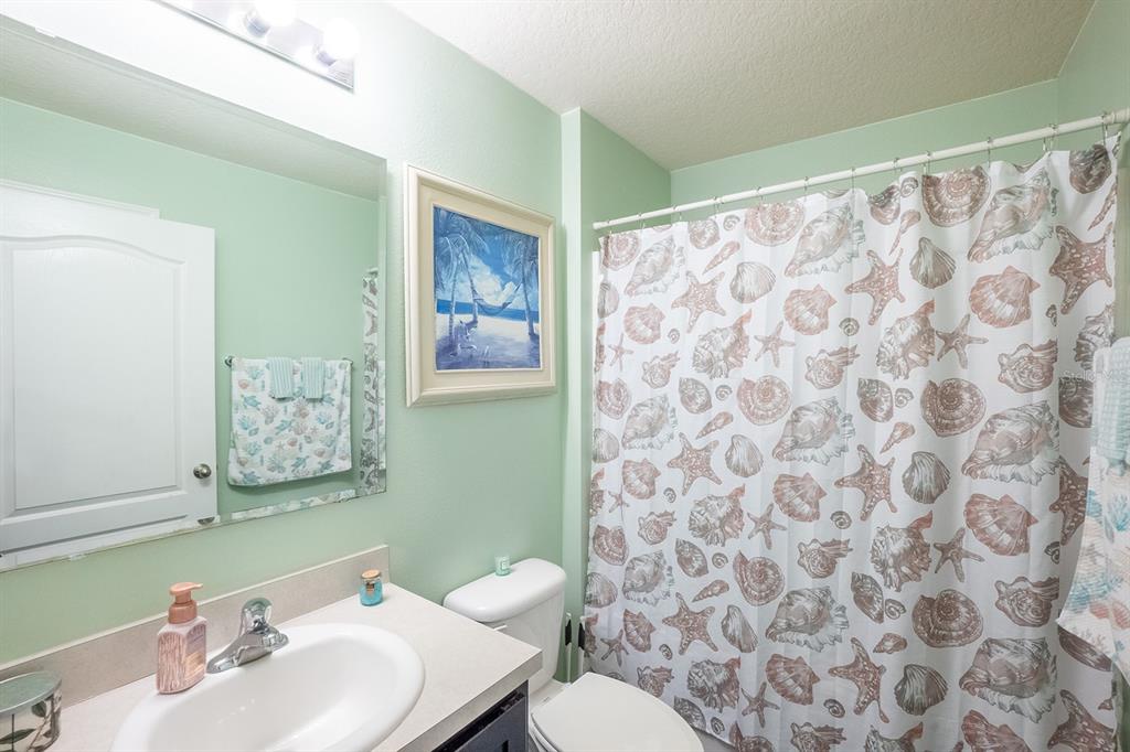 15 Grand Par Court Bunnell, FL 32110 - Photo 9 of 61 a bathroom with a sink and a mirror