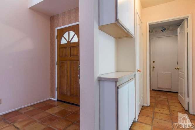 529 Fairfield Road Simi Valley, CA 93065 - Photo 11 of 21 a view of a hallway with wooden floor and closet