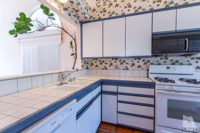 529 Fairfield Road Simi Valley, CA 93065 - Photo 7 of 21 a kitchen with a sink stove and microwave