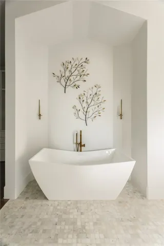 a bathroom with a shower sink and mirror
