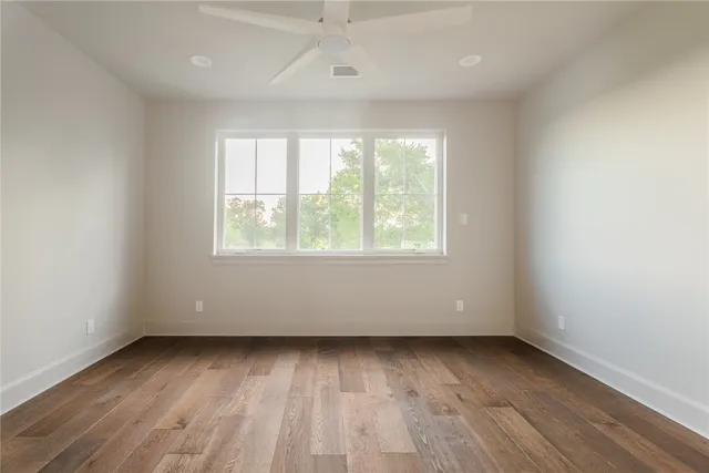 a view of a garden with houses
