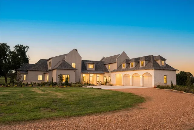 a living room with furniture fireplace and flat screen tv