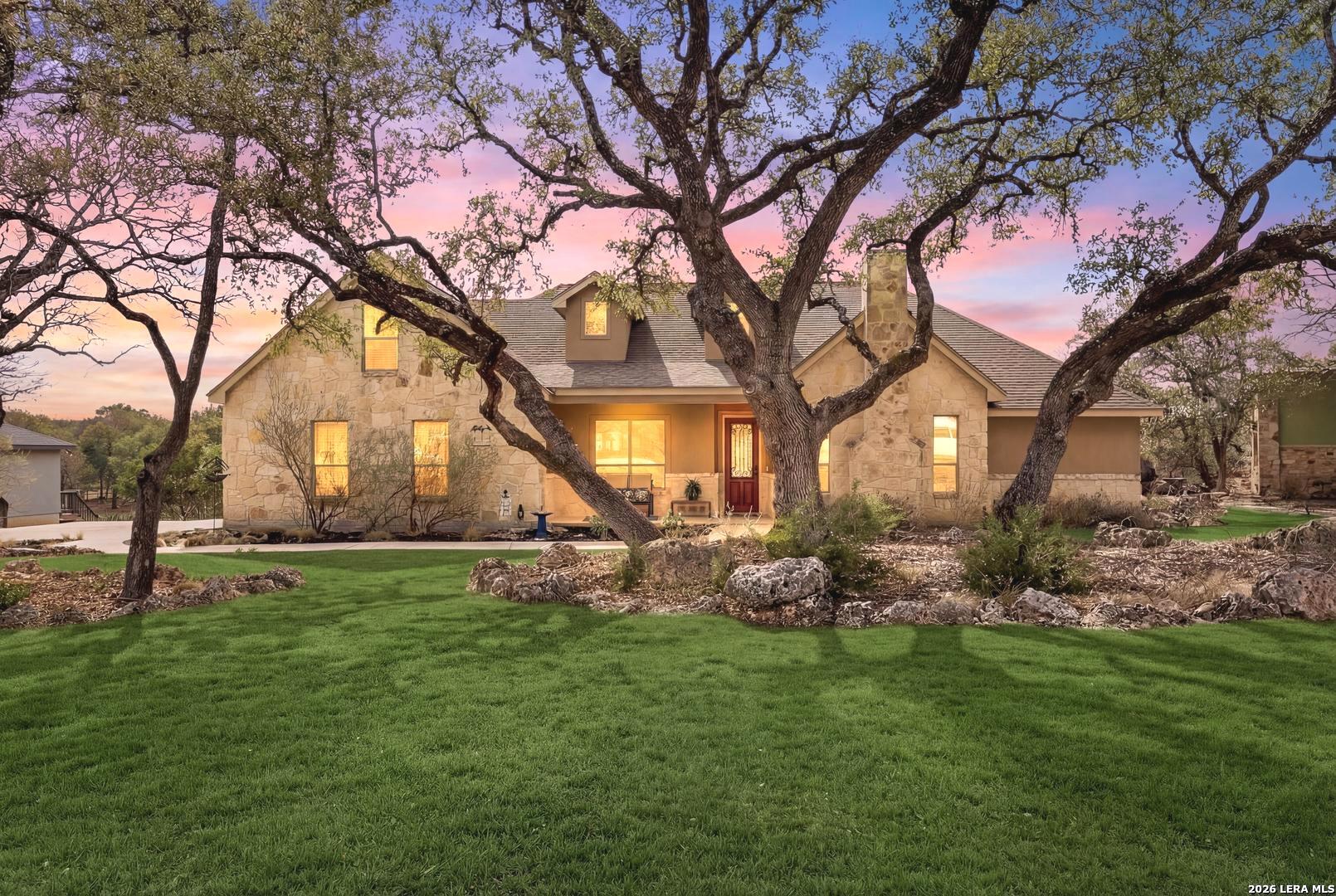 541 Saxet Trail Spring Branch, TX 78070 - Photo 1 of 59 a backyard of a house with lots of green space