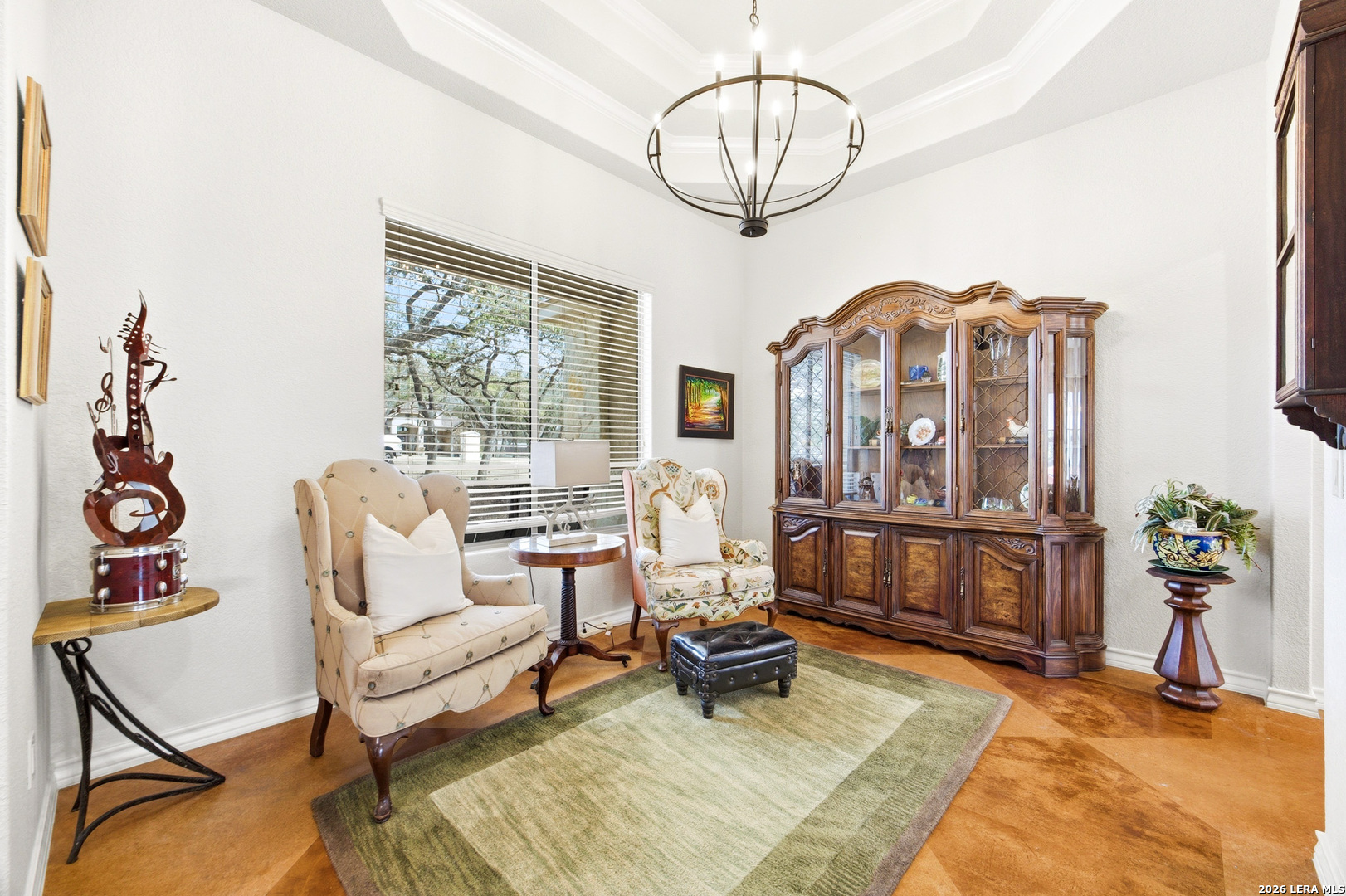 541 Saxet Trail Spring Branch, TX 78070 - Photo 12 of 59 a living room with furniture a dining table and a chandelier