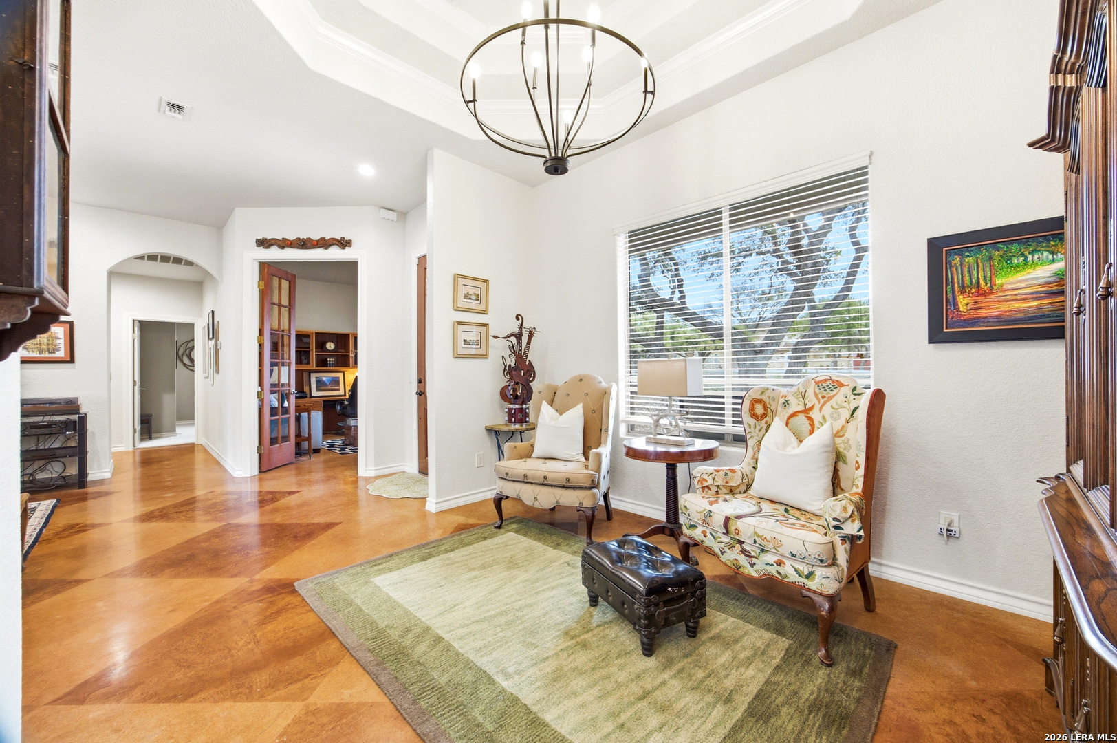 541 Saxet Trail Spring Branch, TX 78070 - Photo 13 of 59 a living room with furniture a clock and a large window