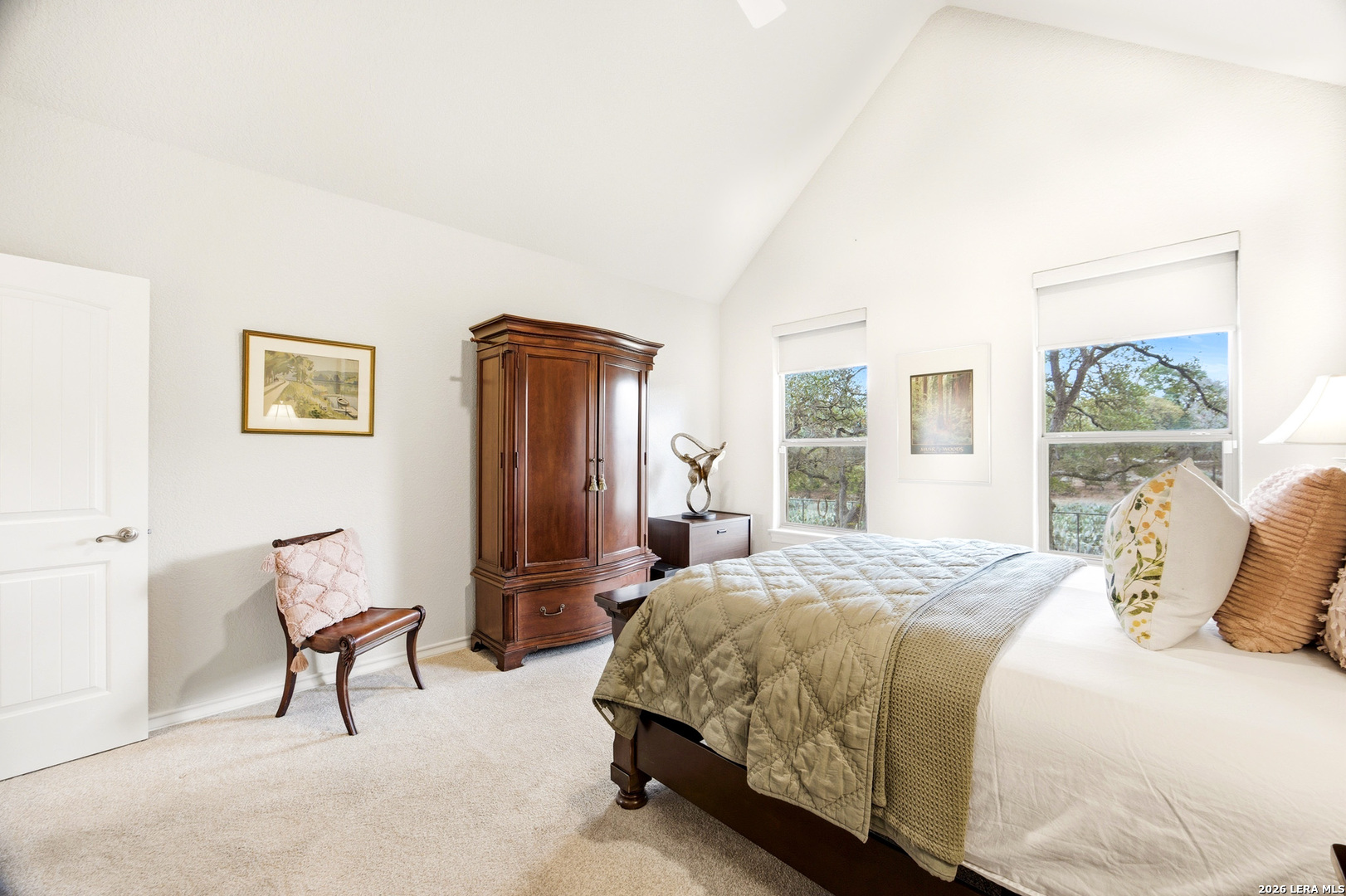 541 Saxet Trail Spring Branch, TX 78070 - Photo 22 of 59 a bedroom with a bed chair and next to a window