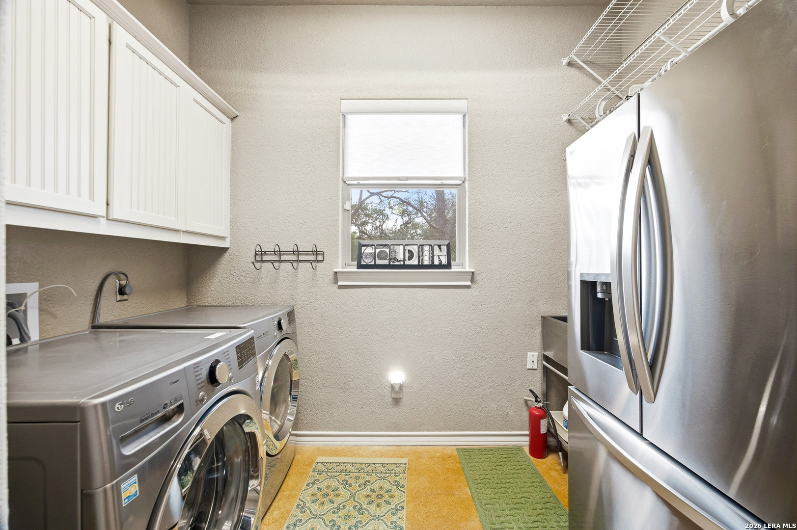 541 Saxet Trail Spring Branch, TX 78070 - Photo 30 of 59 a view of a kitchen with storage and utility