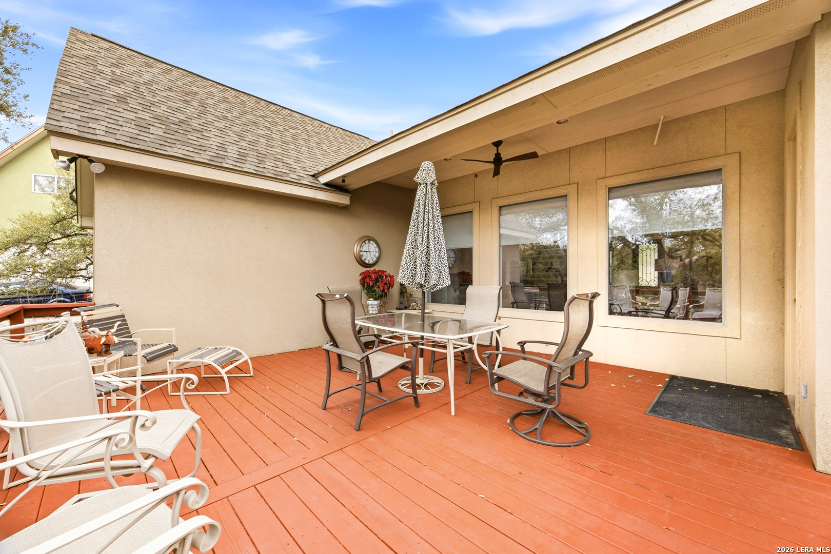 541 Saxet Trail Spring Branch, TX 78070 - Photo 33 of 59 a view of a patio with table and chairs near a barbeque