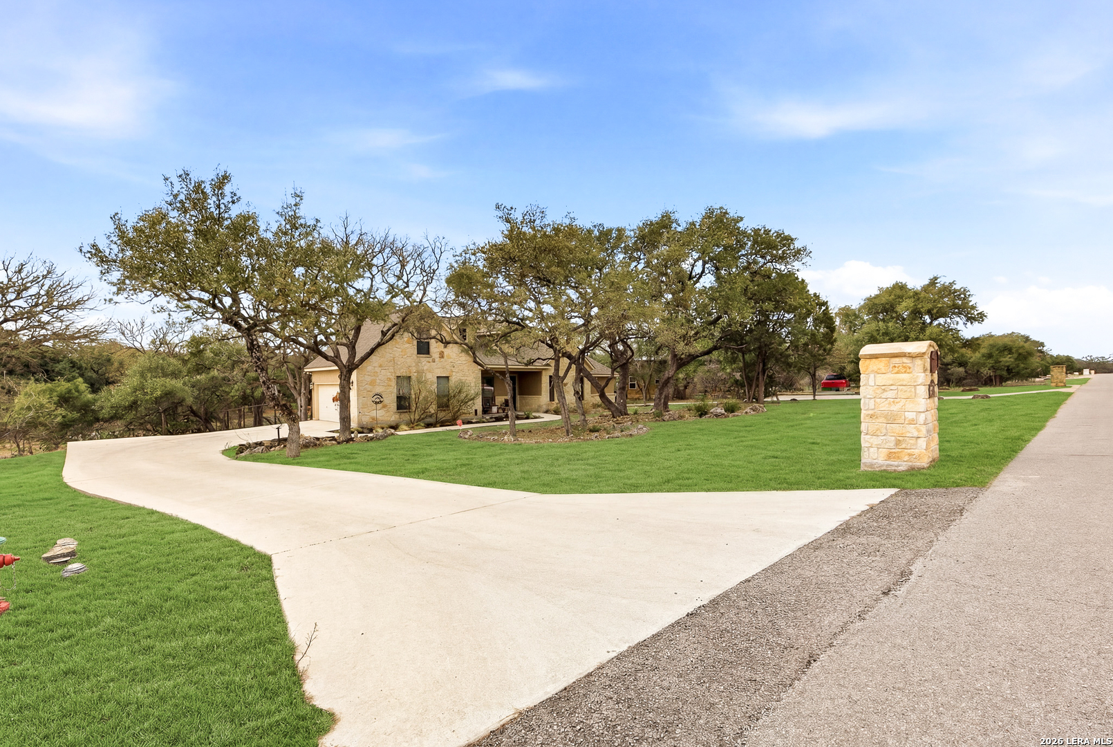 541 Saxet Trail Spring Branch, TX 78070 - Photo 41 of 59 a view of a house with a yard and large trees