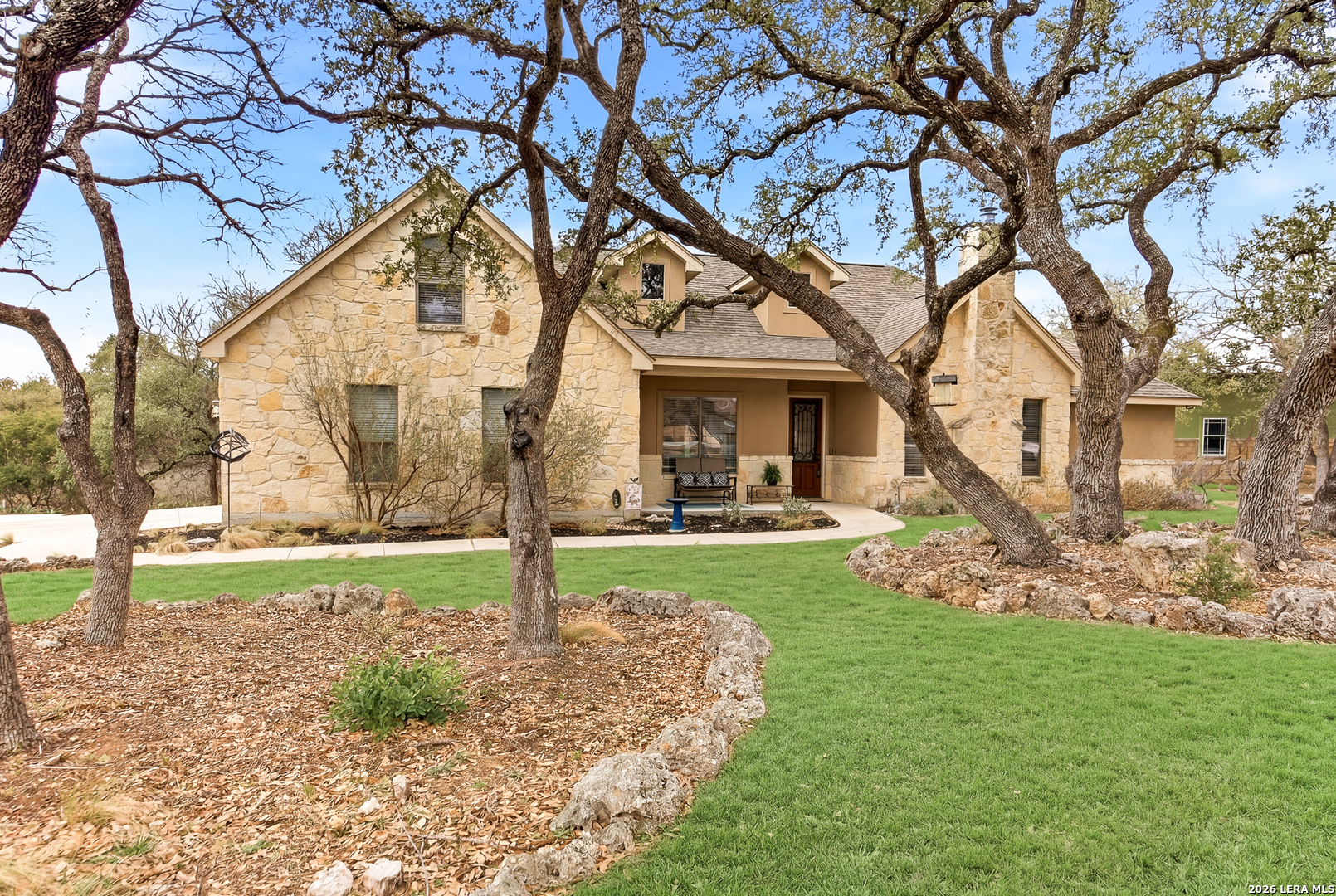 541 Saxet Trail Spring Branch, TX 78070 - Photo 43 of 59 a view of a house with backyard and tree