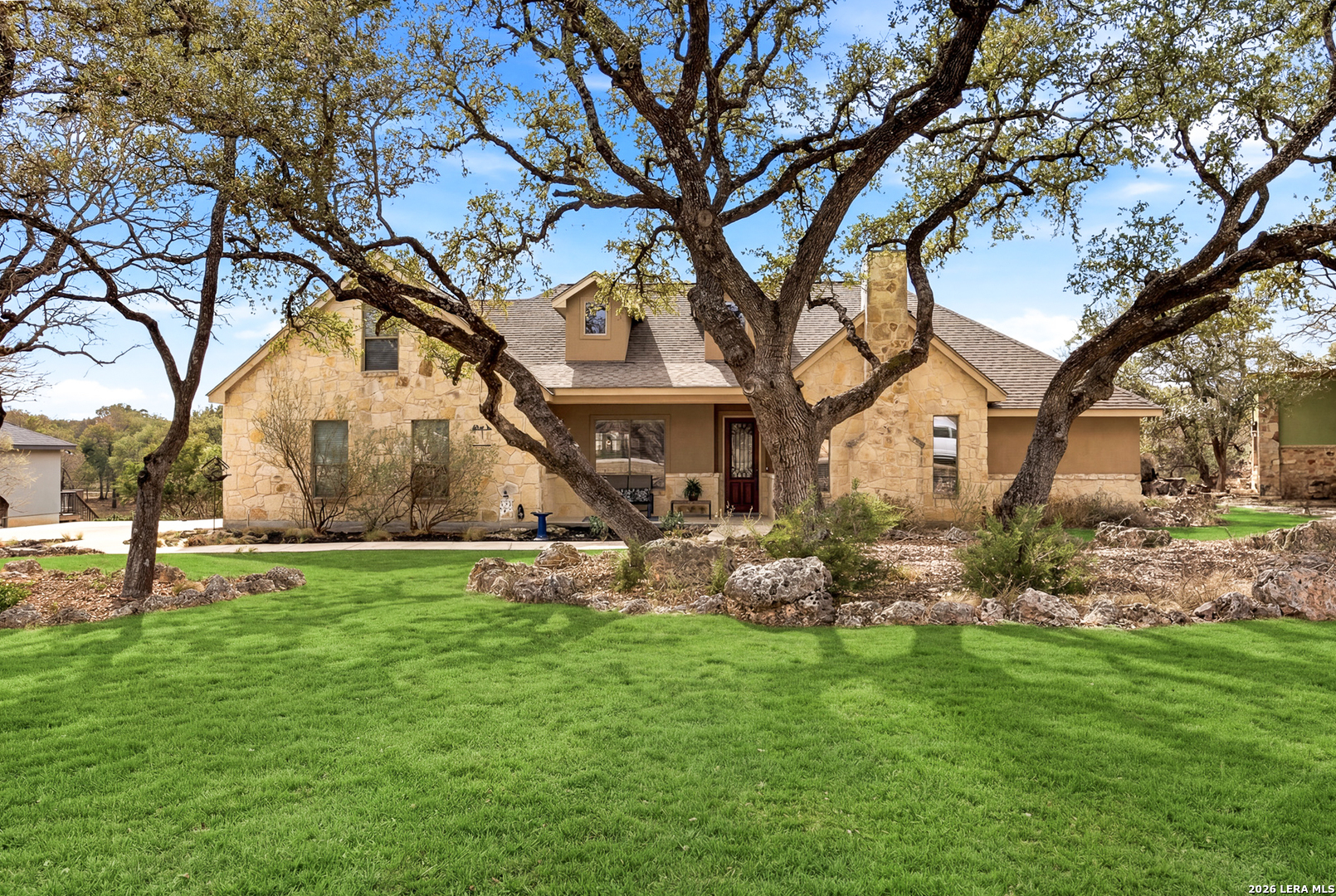 541 Saxet Trail Spring Branch, TX 78070 - Photo 6 of 59 a backyard of a house with table and chairs