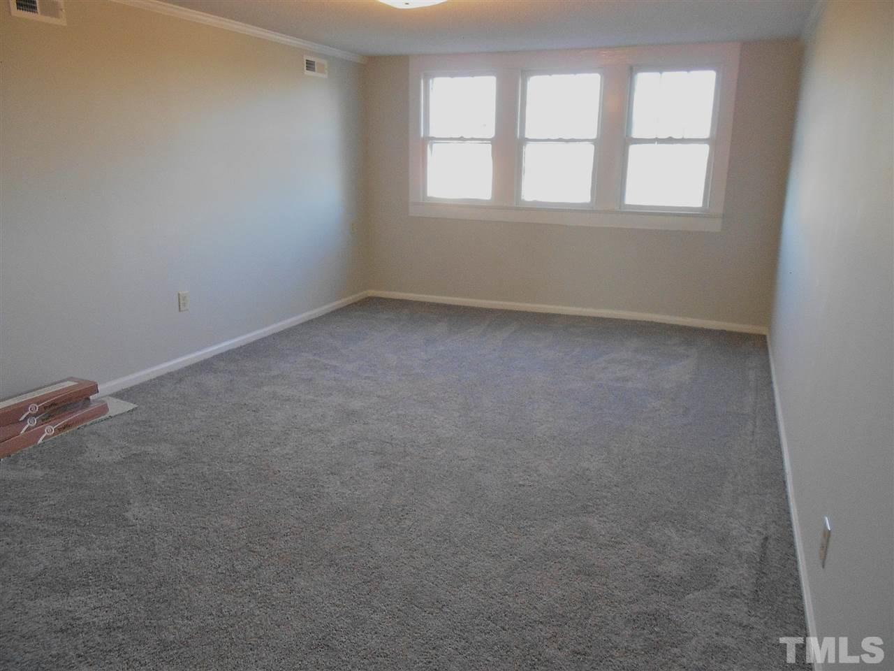 9408 Walter Myatt Road Fuquay-Varina, NC 27526 - Photo 14 of 25 an empty room with a window