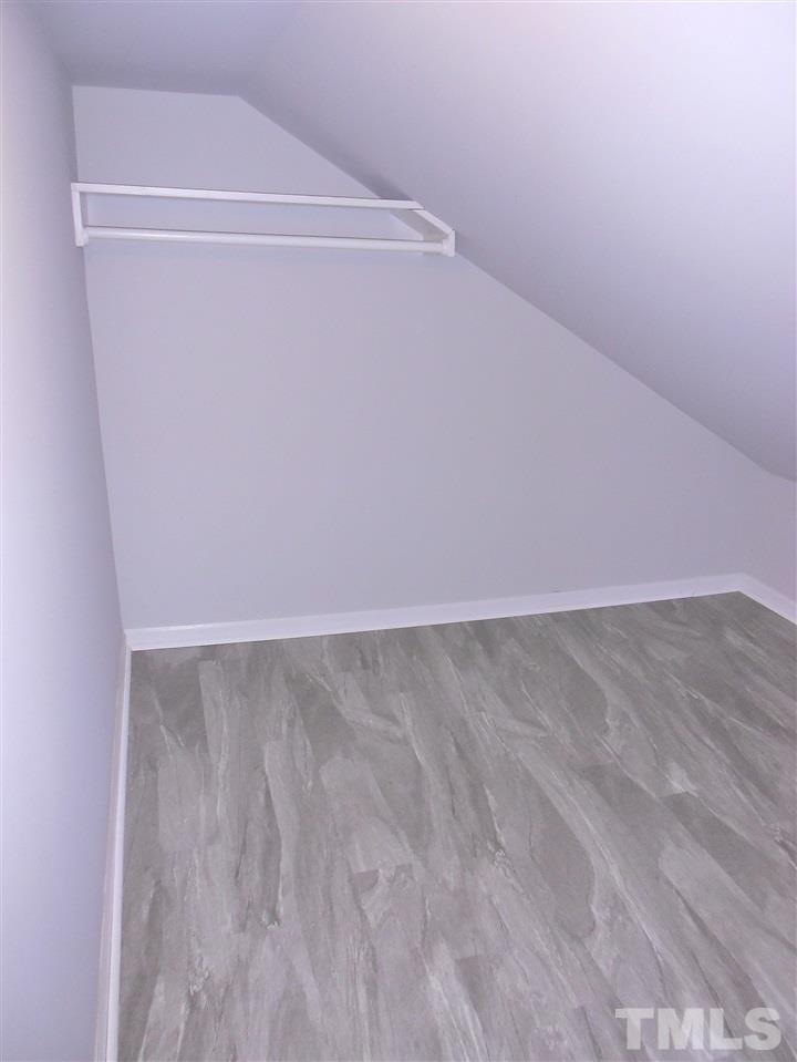 9408 Walter Myatt Road Fuquay-Varina, NC 27526 - Photo 18 of 25 a view of a room with wooden floor