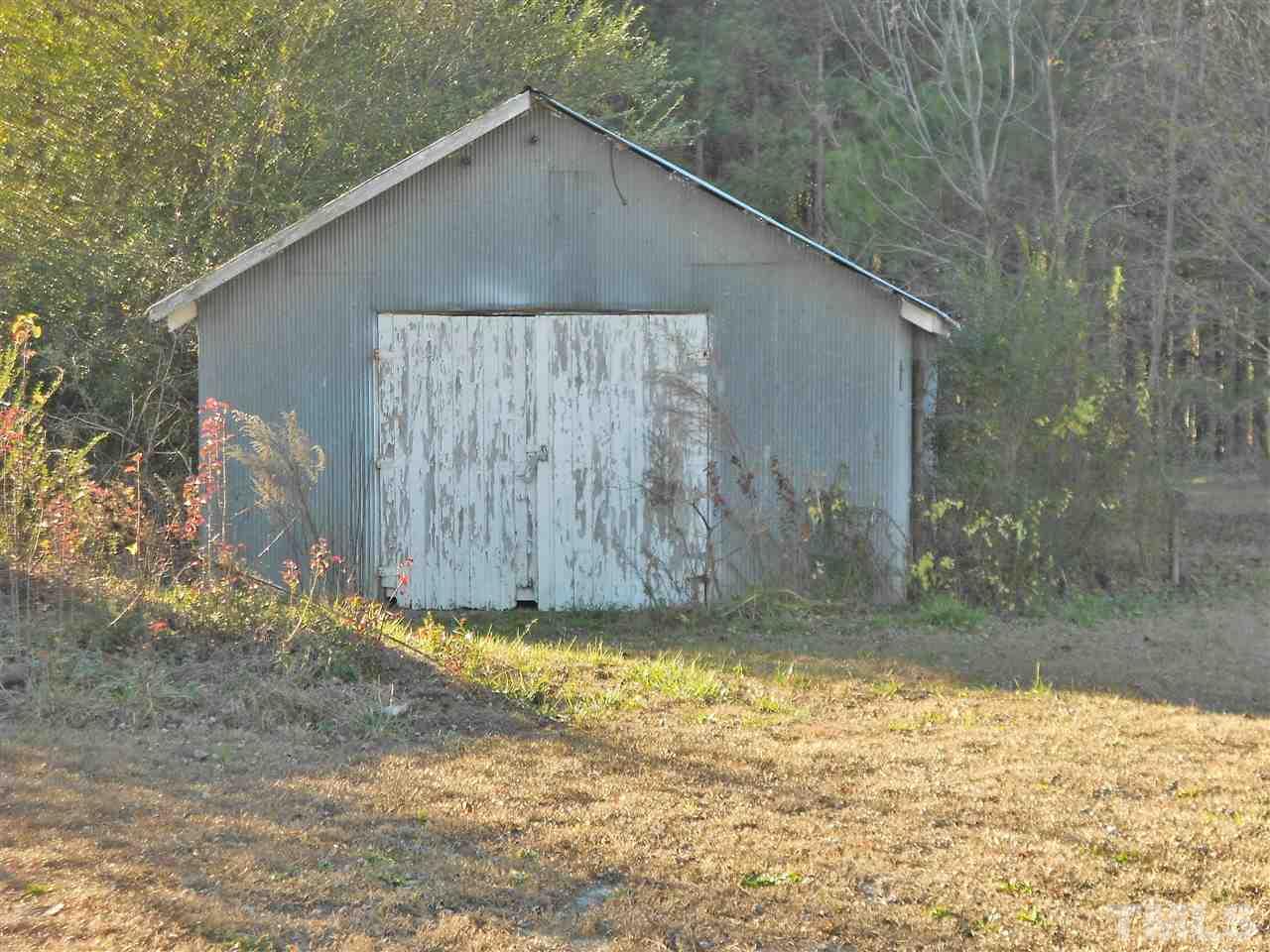 9408 Walter Myatt Road Fuquay-Varina, NC 27526 - Photo 22 of 25 a backyard of a house