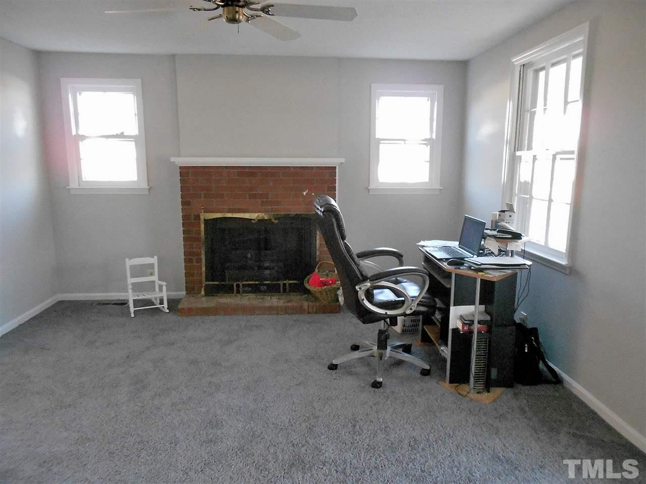 9408 Walter Myatt Road Fuquay-Varina, NC 27526 - Photo 7 of 25 a view of a room with gym equipment