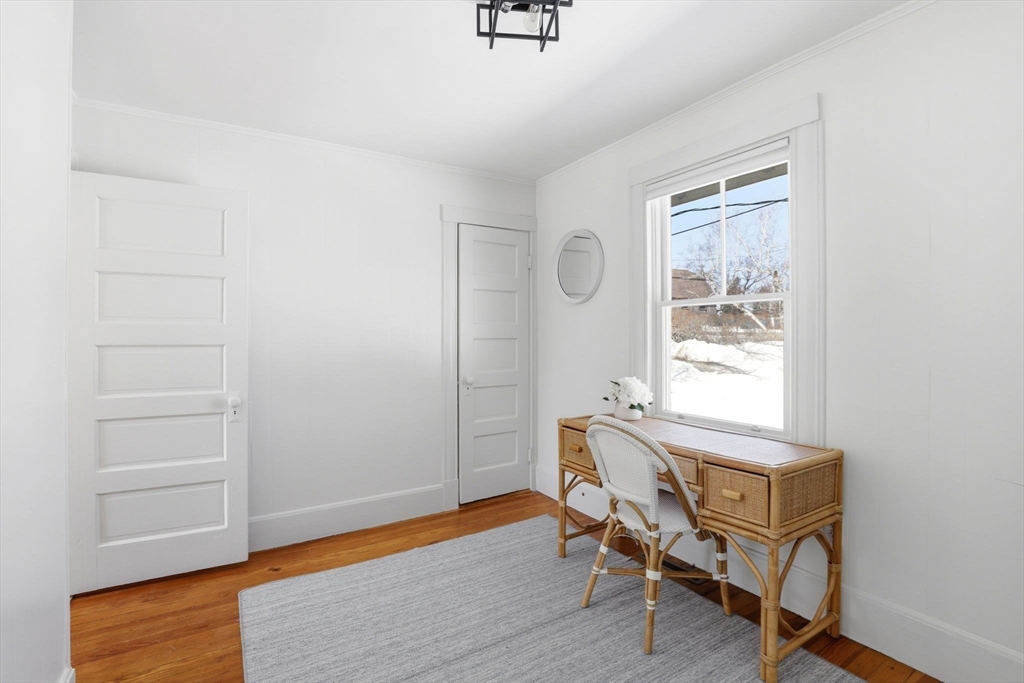 2 Cliff Road Hingham, MA 02043 - Photo 13 of 22 a workspace with wooden floor and a window