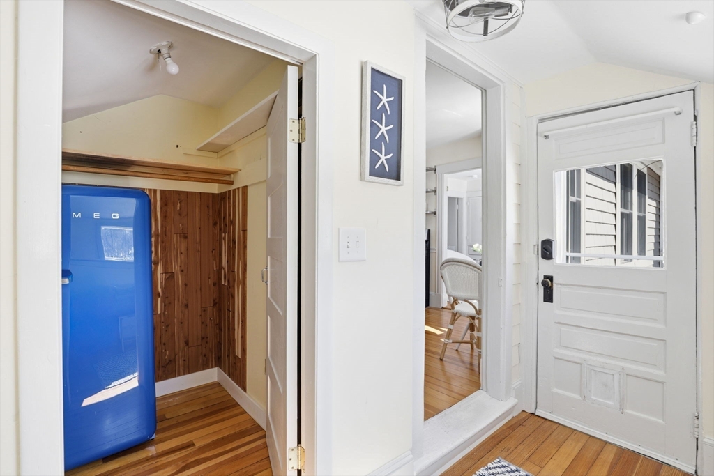 2 Cliff Road Hingham, MA 02043 - Photo 15 of 22 a view of a hallway with wooden floor and closet