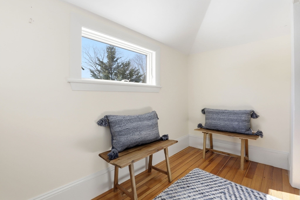2 Cliff Road Hingham, MA 02043 - Photo 16 of 22 a living room with furniture and a rug