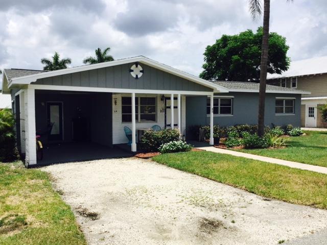 45 Southwest Cabana Point Circle, Unit CIRCLE Stuart, FL 34994 - Photo 2 of 17 45 SW Cabana Point Cir front elev 3