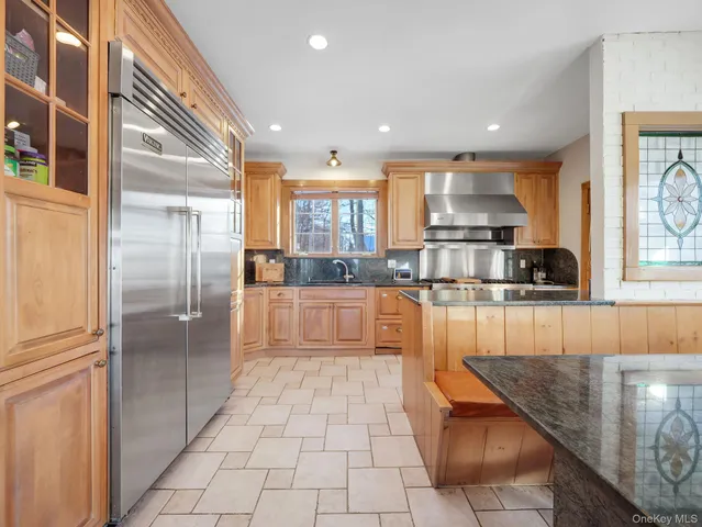 a living room with furniture window and wooden floor