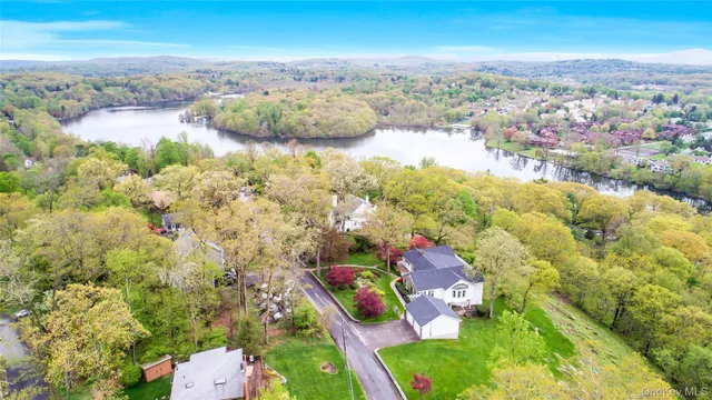 a view of a building with snow on the road