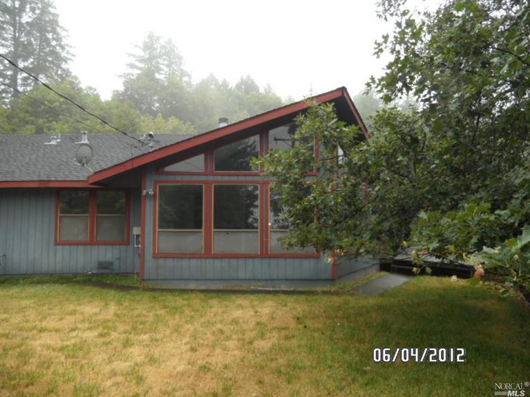 8588 St Helena Road Santa Rosa, CA 95404 - Photo 1 of 1 a view of a house with a yard