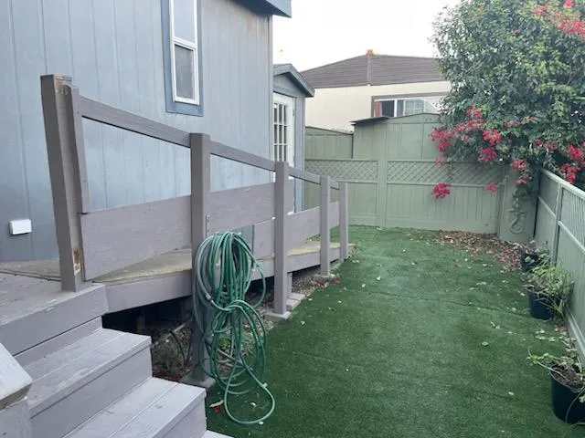 a house view with a garden space