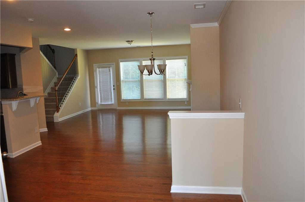 4390 Cedar Bridge Walk Suwanee, GA 30024 - Photo 2 of 14 a view of an entryway with wooden floor