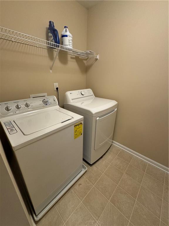 4390 Cedar Bridge Walk Suwanee, GA 30024 - Photo 10 of 14 a utility room with dryer and washer