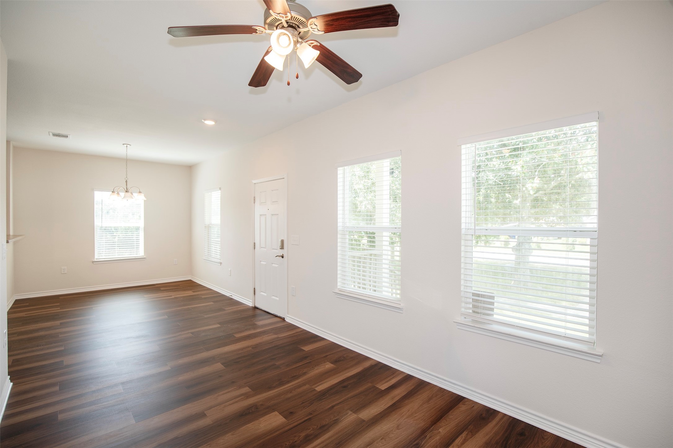1125 Lake Road La Marque, TX 77568 - Photo 5 of 26 The family room has large windows that overlook the front yard.
