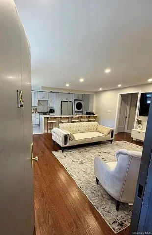 a living room with furniture and a table