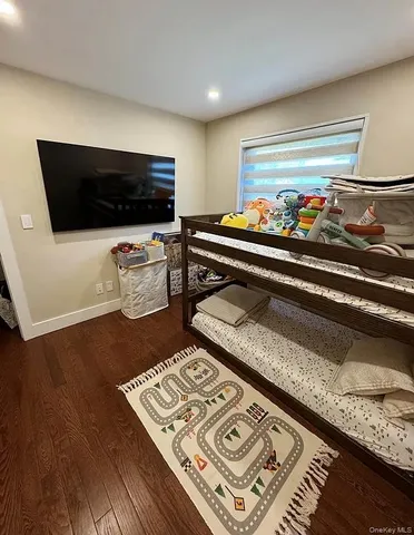 a living room with a couch and a flat screen tv