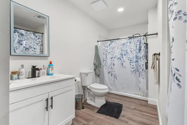 a view of bathroom with a sink and a toilet