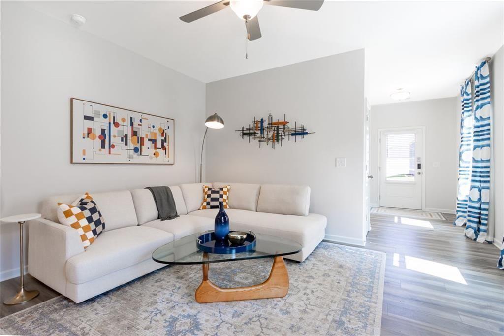 141 Andros Loop Dalton, GA 30721 - Photo 3 of 25 a living room with furniture and wooden floor