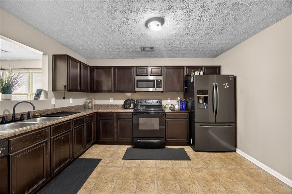 5089 Summerview Way Morrow, GA 30260 - Photo 8 of 24