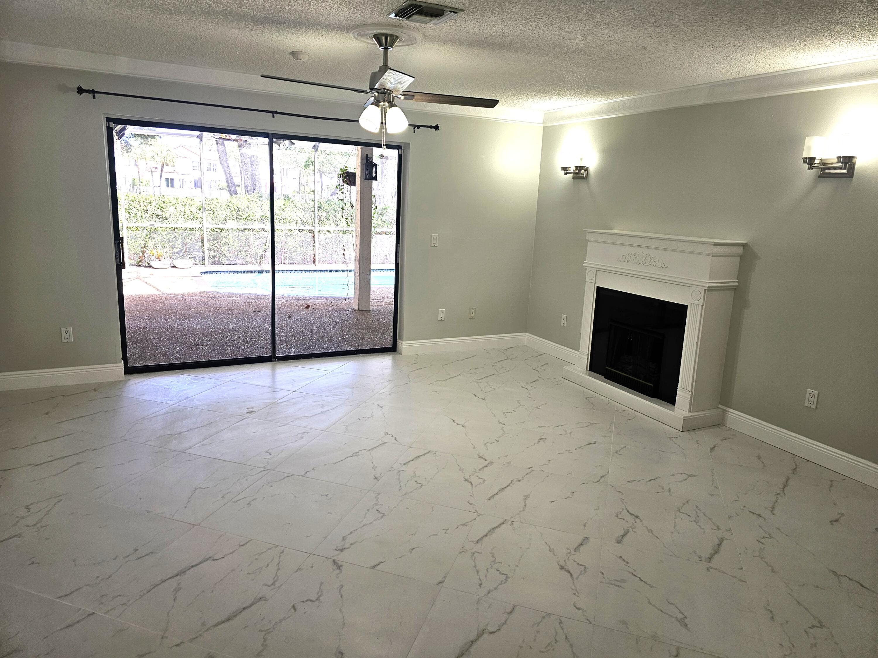 4045 Birchwood Drive Boca Raton, FL 33487 - Photo 2 of 11 Living Room 1