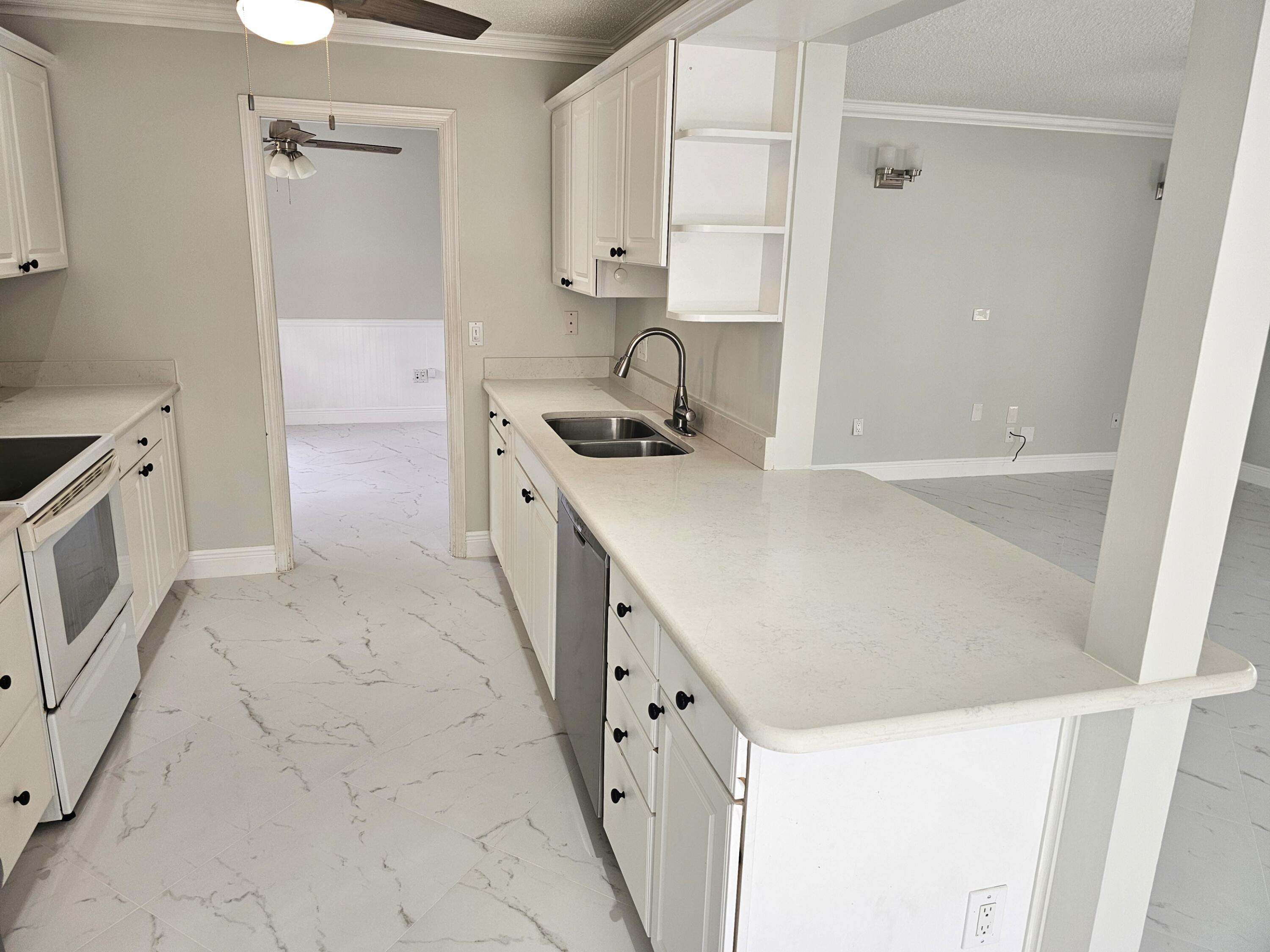 4045 Birchwood Drive Boca Raton, FL 33487 - Photo 4 of 11 Kitchen View