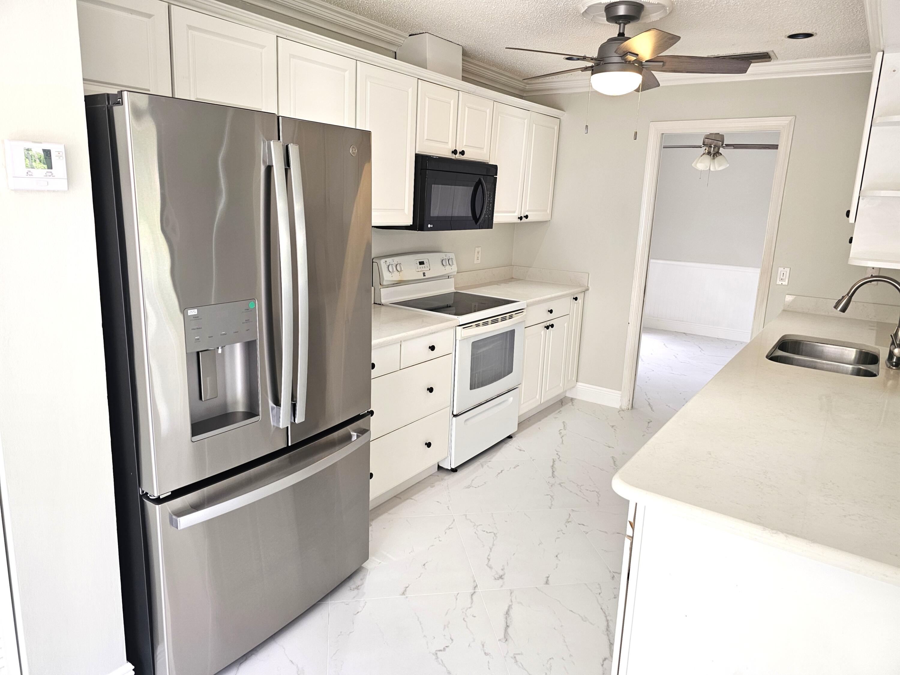 4045 Birchwood Drive Boca Raton, FL 33487 - Photo 5 of 11 Kitchen View 2