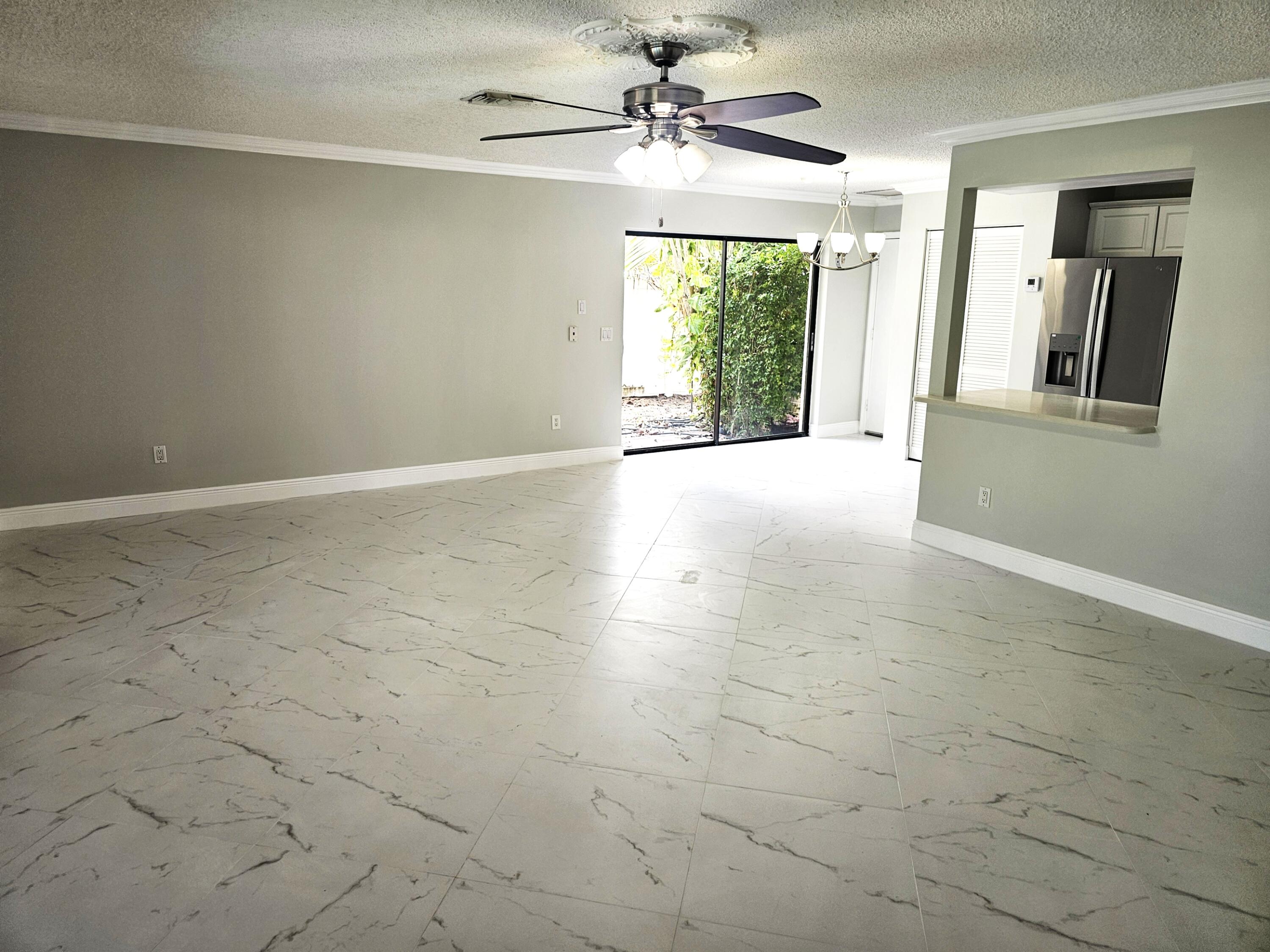 4045 Birchwood Drive Boca Raton, FL 33487 - Photo 7 of 11 Family Room 1