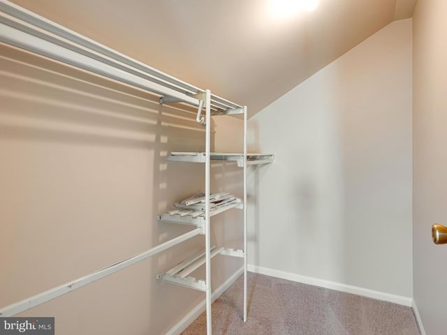 a view of an empty room with empty racks