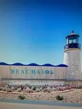 a view of a building and car parked