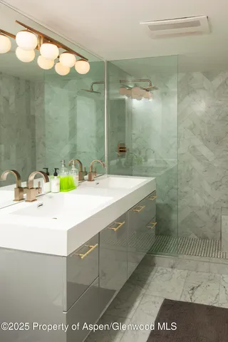 a view of a storage & utility room with a sink