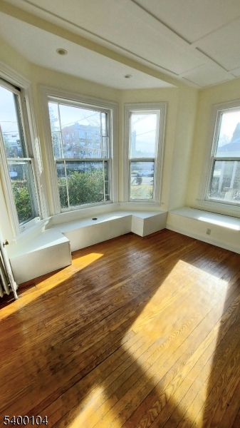 80 Grove Street Montclair, NJ 07042 - Photo 10 of 15 a view of empty room with wooden floor and fan