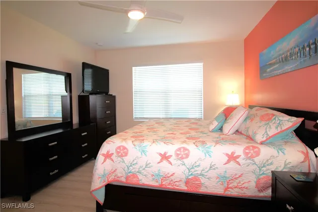 a bathroom with a shower sink and mirror