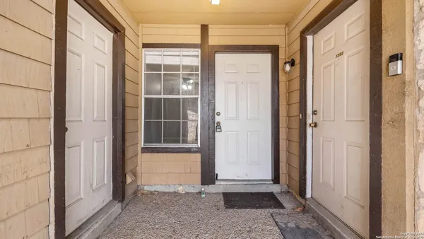a view of front door with a glass door
