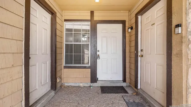 a view of front door with a glass door