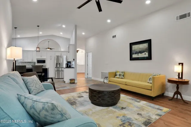 a living room with furniture and a couch